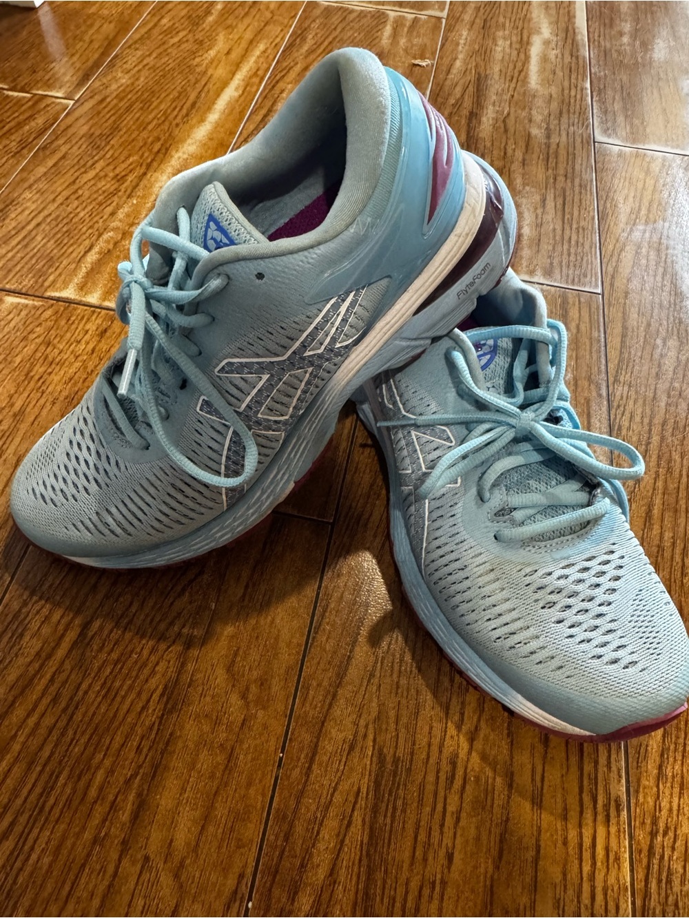 Asics Women's Light Blue Athletic Running Shoes with Subtle Pink Accents